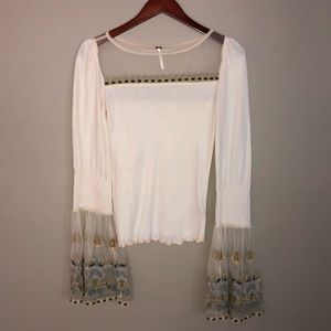 Bell sleeved, lace-embroidered Free People top